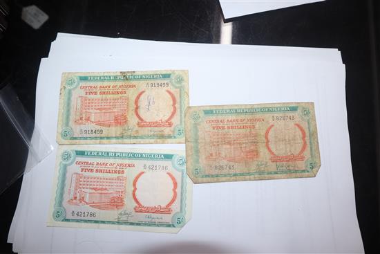 A collection of African and Egyptian currency, including Bank of Biafra banknotes,